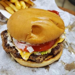 a juicy burger at Sheila c's burger barn in Auburn alabama