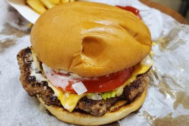 a juicy burger at Sheila c's burger barn in Auburn alabama
