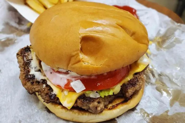 a juicy burger at Sheila c's burger barn in Auburn alabama