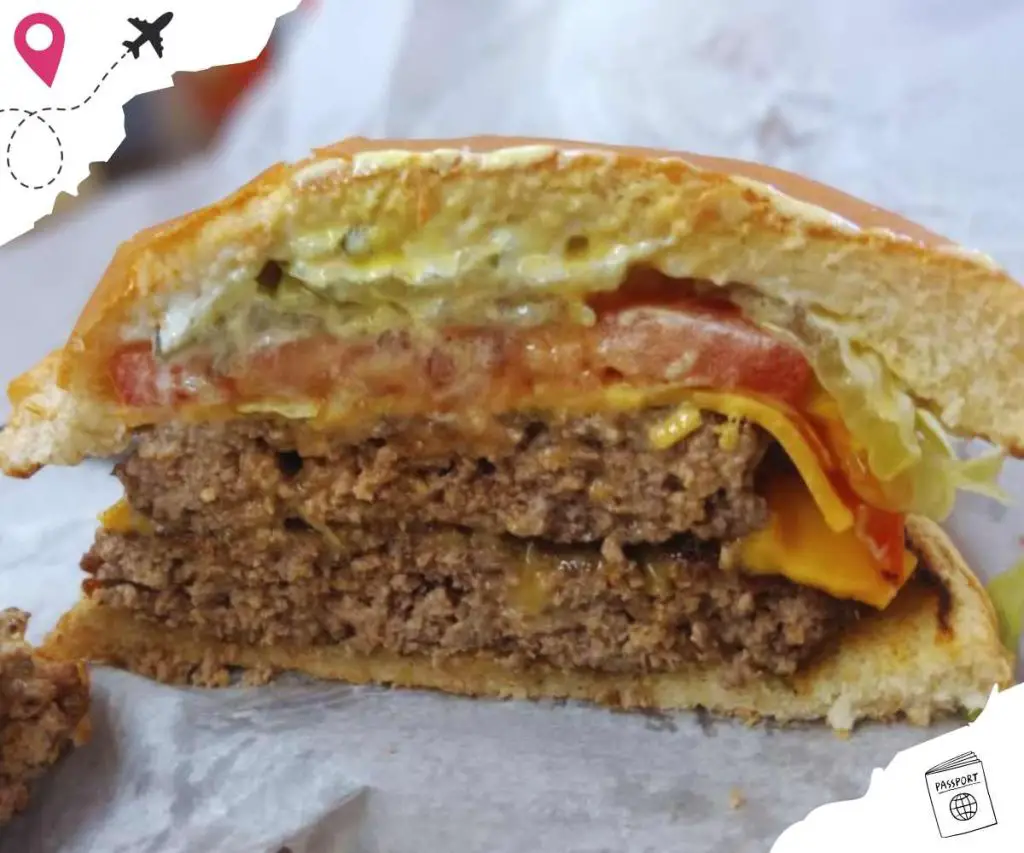 juicy double cheeseburger at shela c's burger barn in Auburn alabama