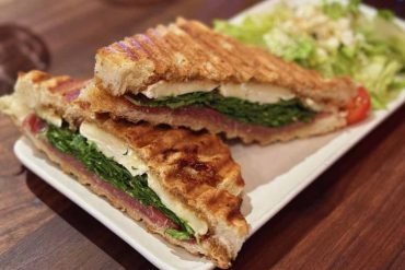 prosciutto and brie panini at postino's in Irvine ca