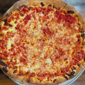 Italian cheese pizza at santarpio's pizza in Boston massachusetts