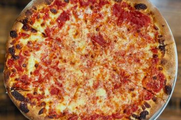 Italian cheese pizza at santarpio's pizza in Boston massachusetts