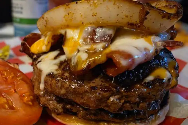 huge burger at coyote bluff cafe in Amarillo, Texas