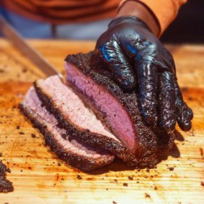 slicing juicy brisket at back home bbq in little rock arkansas