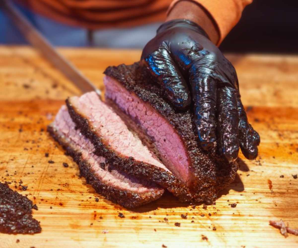 slicing juicy brisket at back home bbq in little rock arkansas