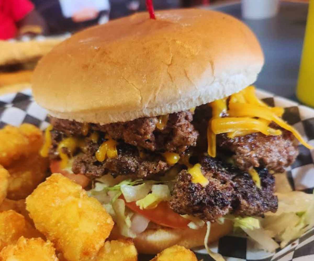 huge burger at jimmy's burgers in Grand prairie, TX