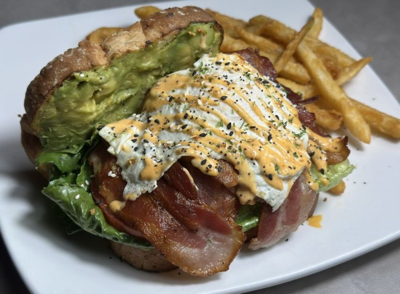 Avocado Toast Sandwich BLT at Mom's Kitchen located in Fort Lauderdale, FL. 