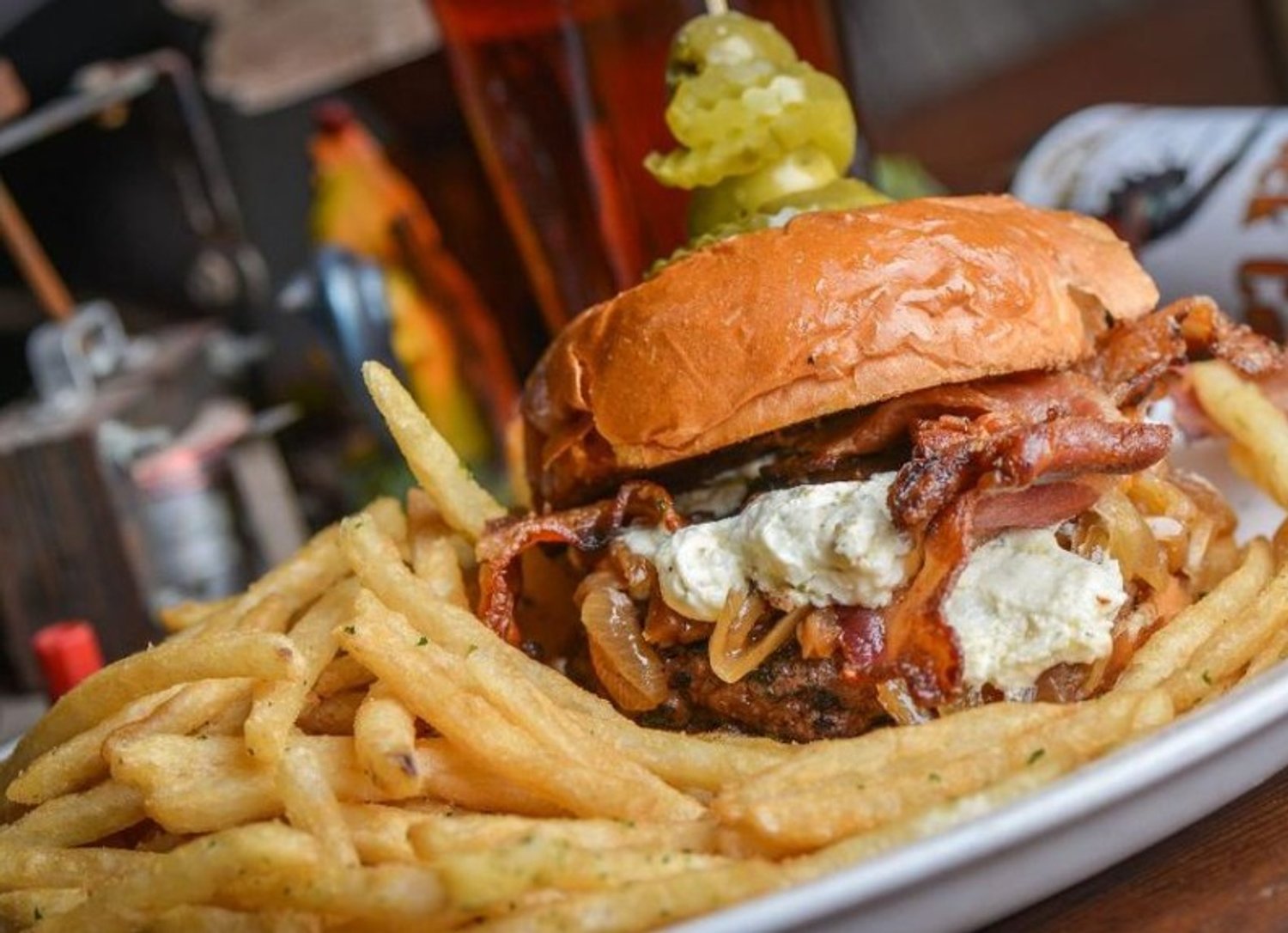 Burger and fries in The Rooster Tavern located in Scottsdale, Arizona.
