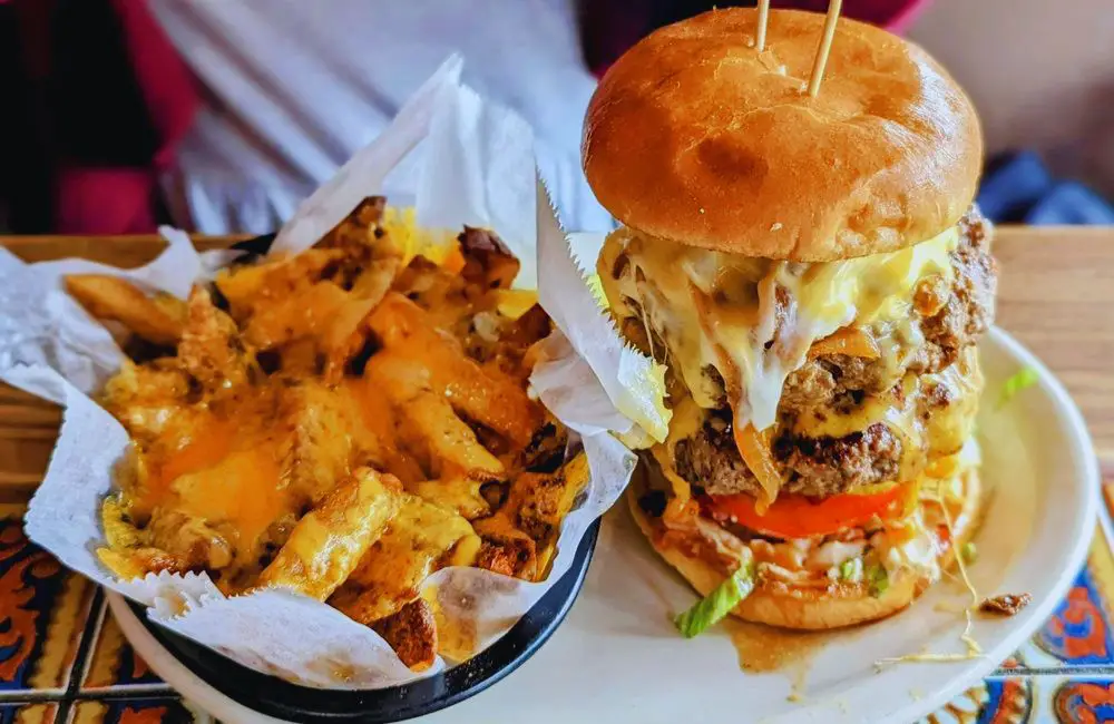 he "Thurmanator" with cheese fries Thurman Cafe in Columbus, OH