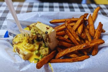 Half Philly with sweet potato fries at Half Philly with sweet potato friesThe Burger And Philly Shack