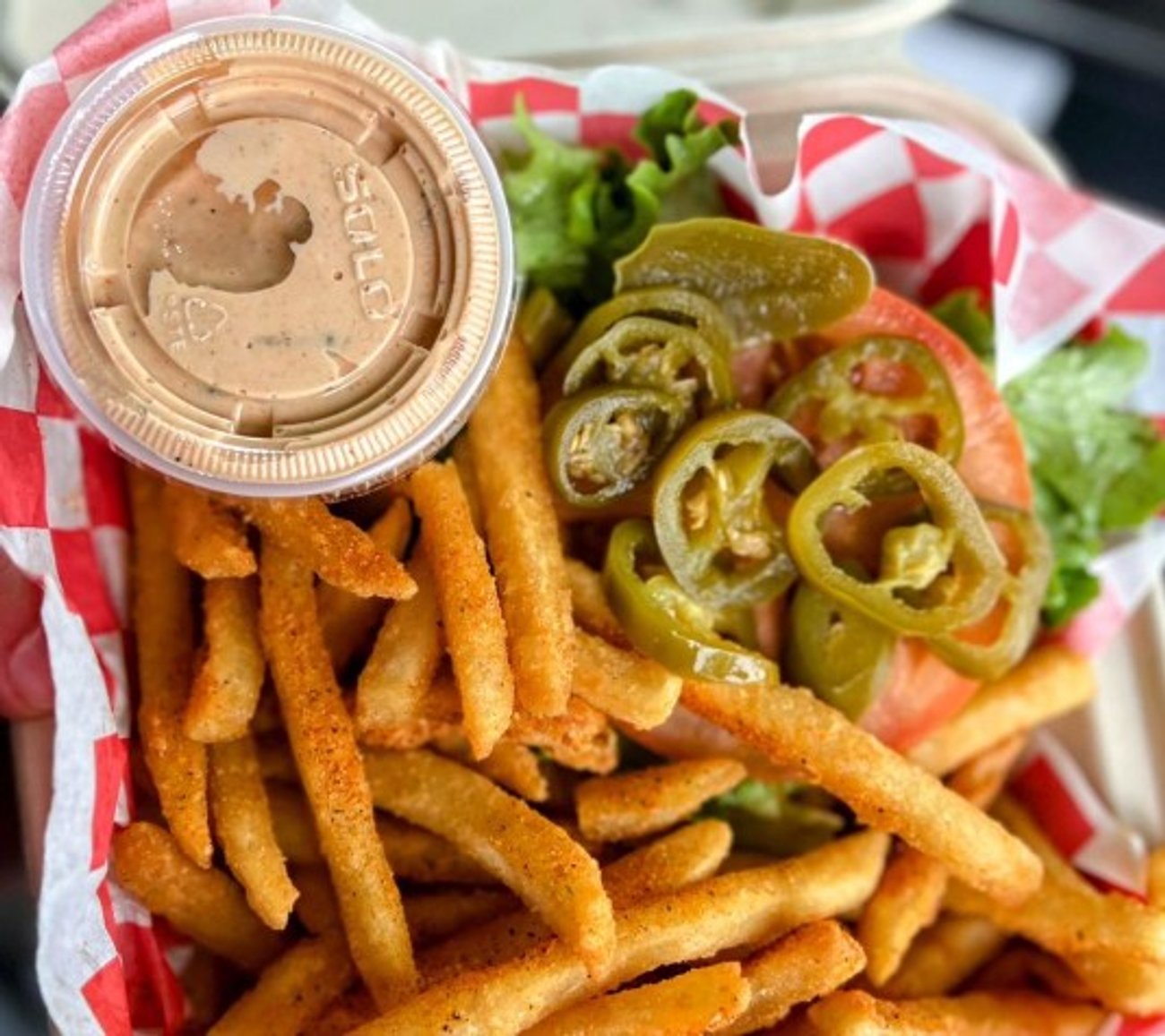 Burger minus bun sub tomato in Cleave Land Grill located in Strongsville, OH.