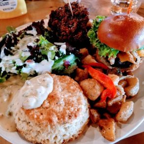 Cobb salad, fried chicken and waffle, wg burger, potatoes, biscuit and gravy in Lovely Day Cafe located in Bedford, TX.