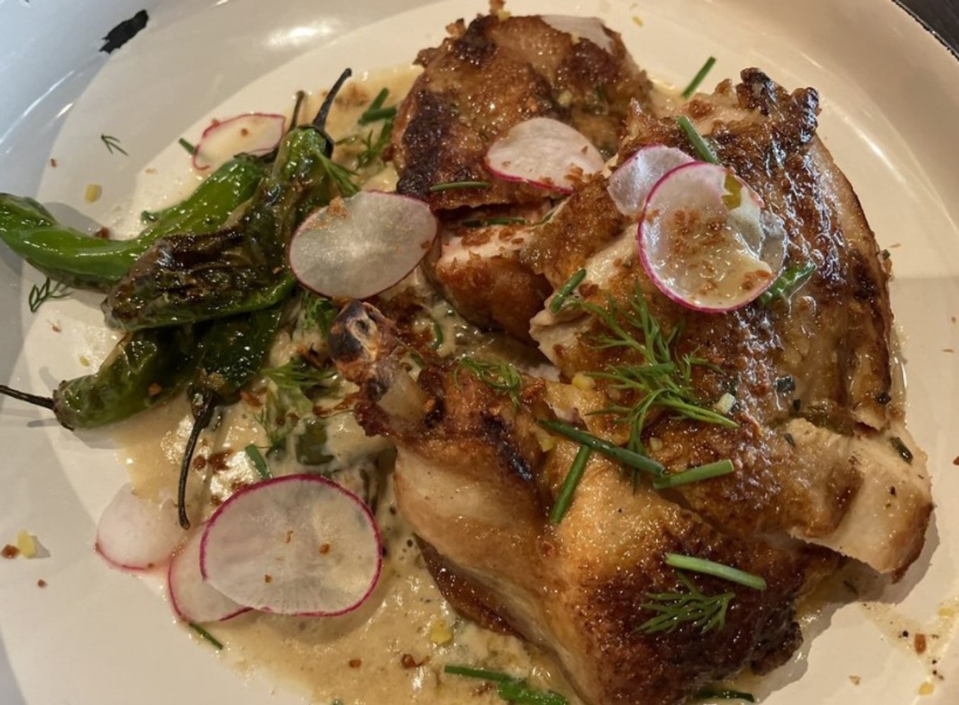 Confit chicken at Olin Bar & Kitchen in Detroit, MI.