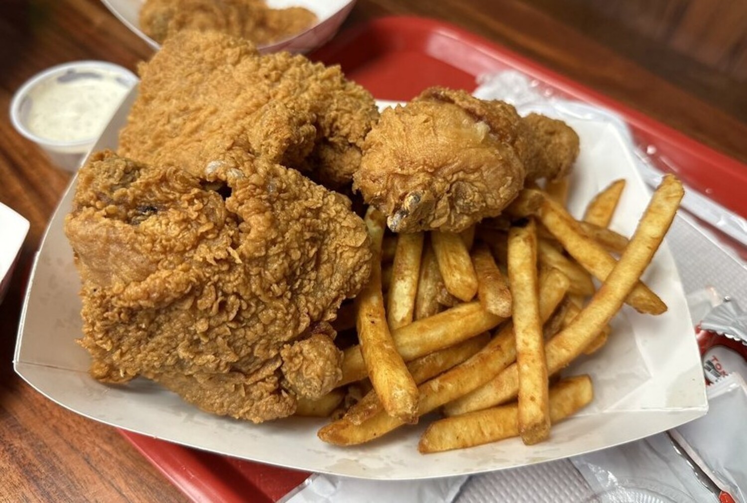 Friend chicken and seasoned fries at Crispy Halal located in Allentown, Pennsylvania.