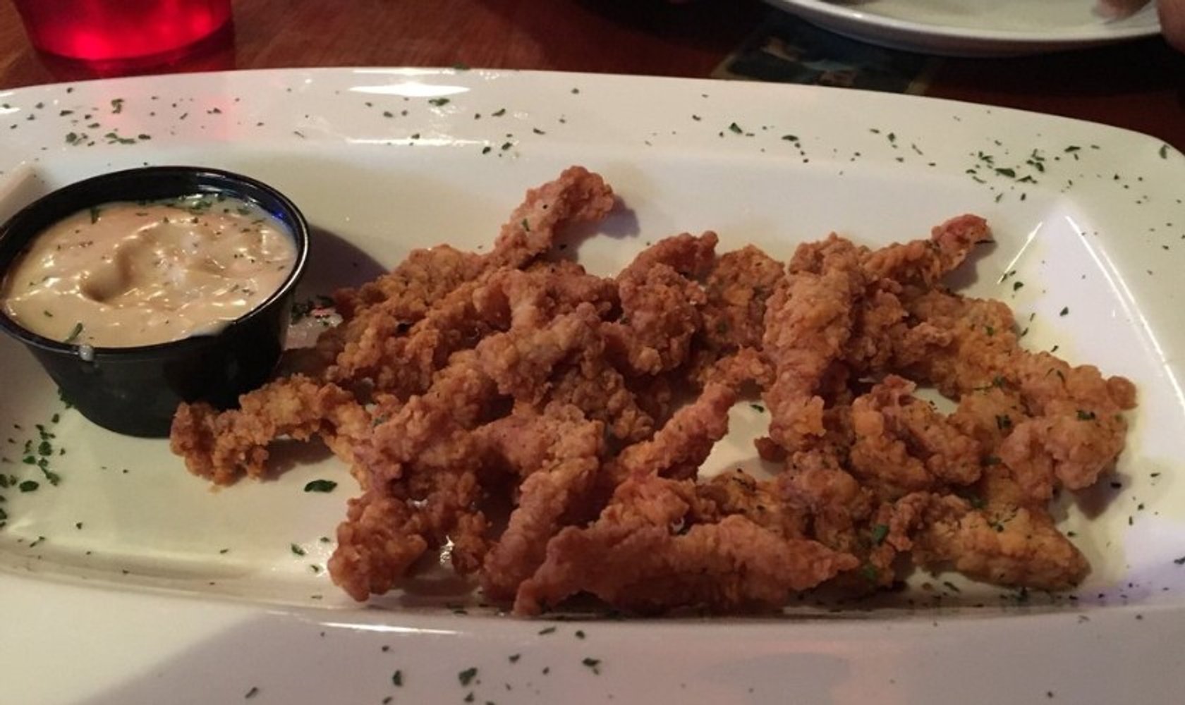  Gator Fingers- alligator tail breaded and deep fried served with creole honey mustard in Buzzard Billy's in La Crosse, WI.