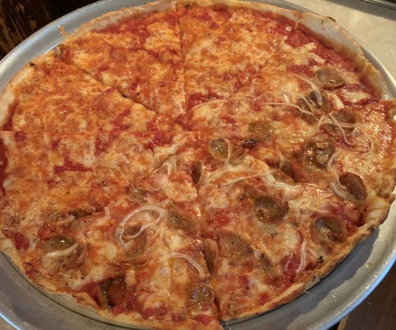 Half sausage onion half plain at Patsy's Tavern & Restaurant located in Paterson, NJ.