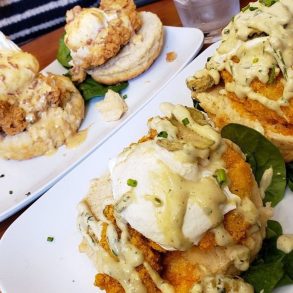 Nashville hot catfish benedict and the chicken st charles benedict at Ruby Slipper Mobile located in Mobile, AL