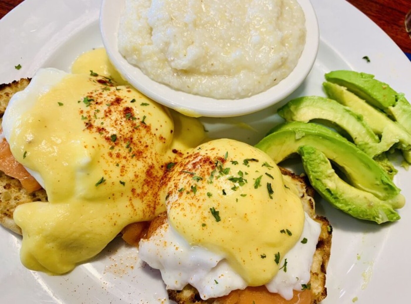 Nova Benedict with side avo at Mom's Kitchen located in Fort Lauderdale, FL. 