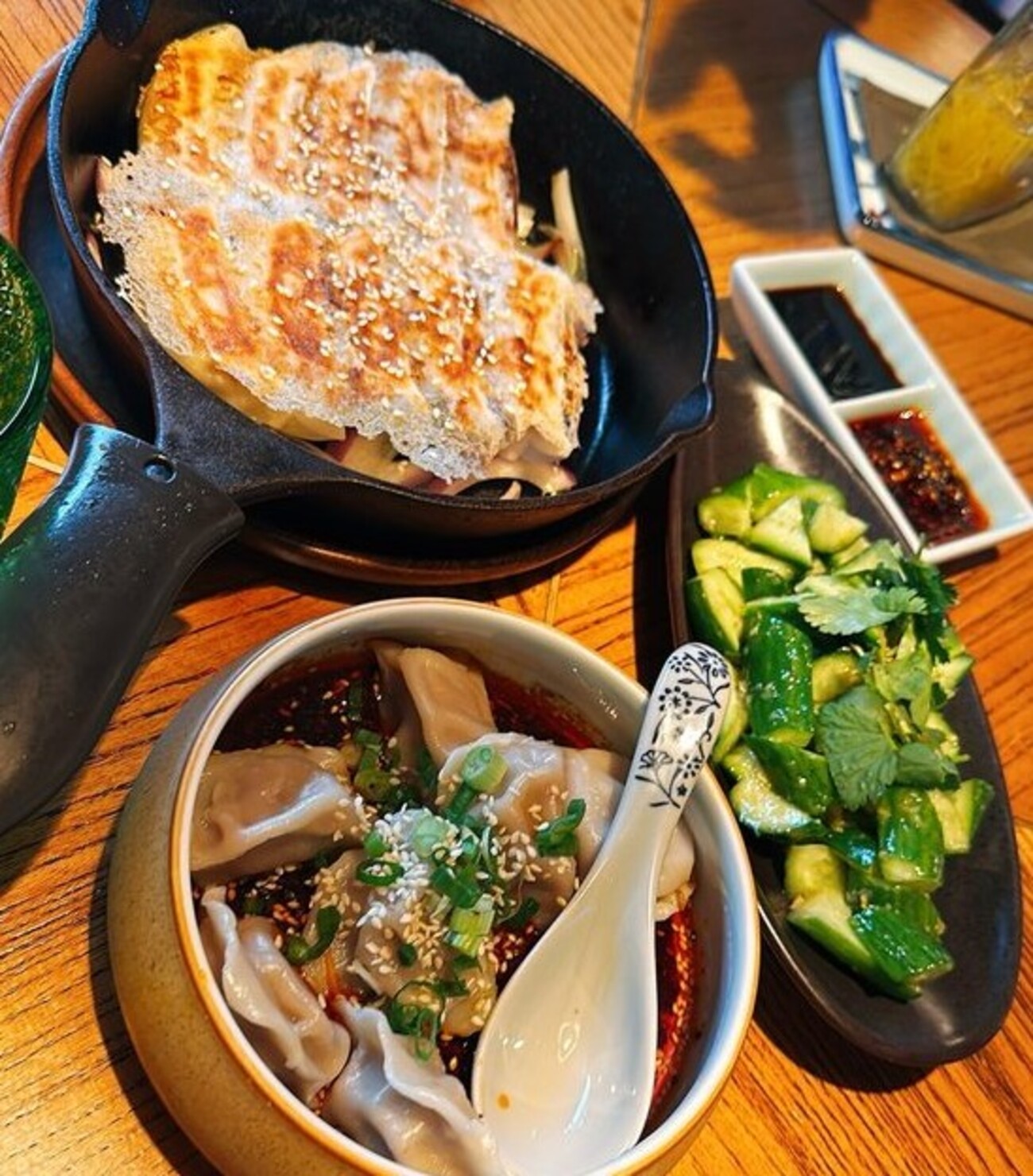 Pan Fried Veggie Dumplings, Cucumber Salad & Alley Chilli Dumplings at Sichuan Alley Bistro located in West Hartford, CT.