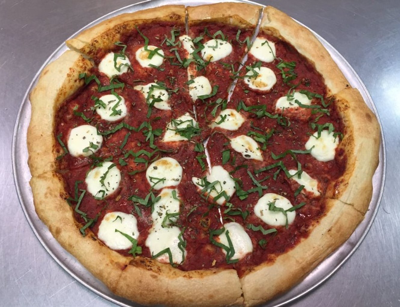 Pizza in PizzAmore located in Albany, OR.