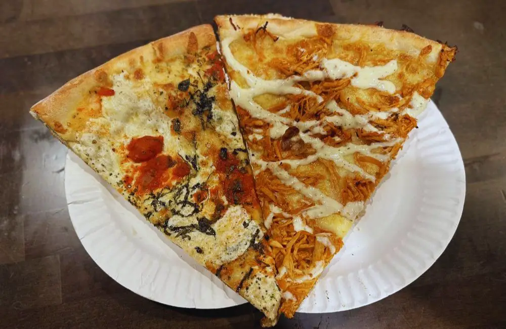 nonna maria (left) and chipotle chicken (right) slices at Bleecker Street Pizza in New York, NY 