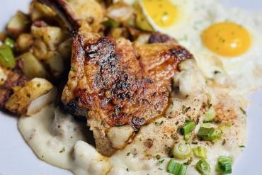 Pork Chop at Mom's Kitchen located in Fort Lauderdale, FL.