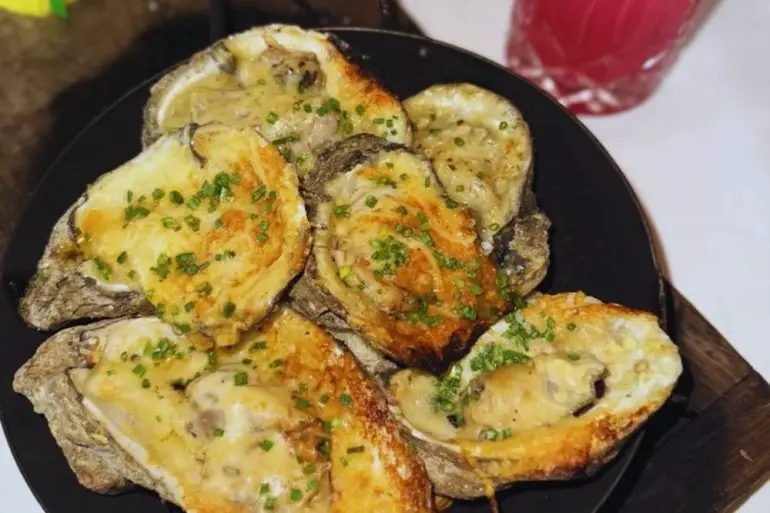 Half and half oysters at La Lucha in Houston, TX