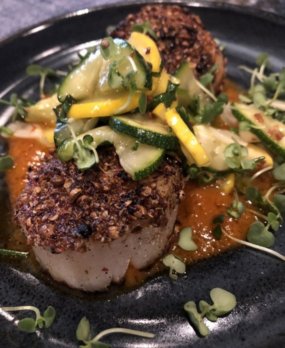 Seared scallop at Olin Bar & Kitchen in Detroit, MI.