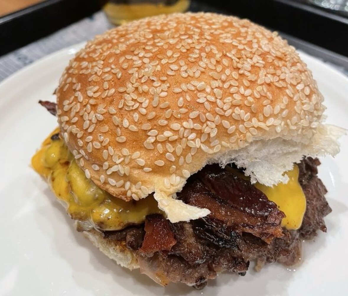 Smash burger with bacon at Track 15 located in Providence, RI.