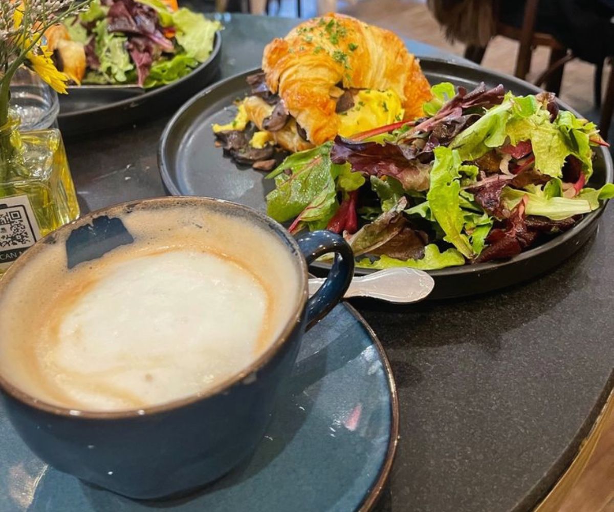 cappucino and breakfast sandwich at cafe sauvage in boston, MA