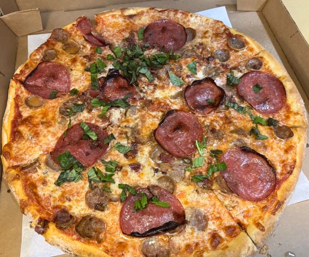 Holy Trio Meat Pizza at Pasquale's Neighborhood Pizzeria in Rochester, MN