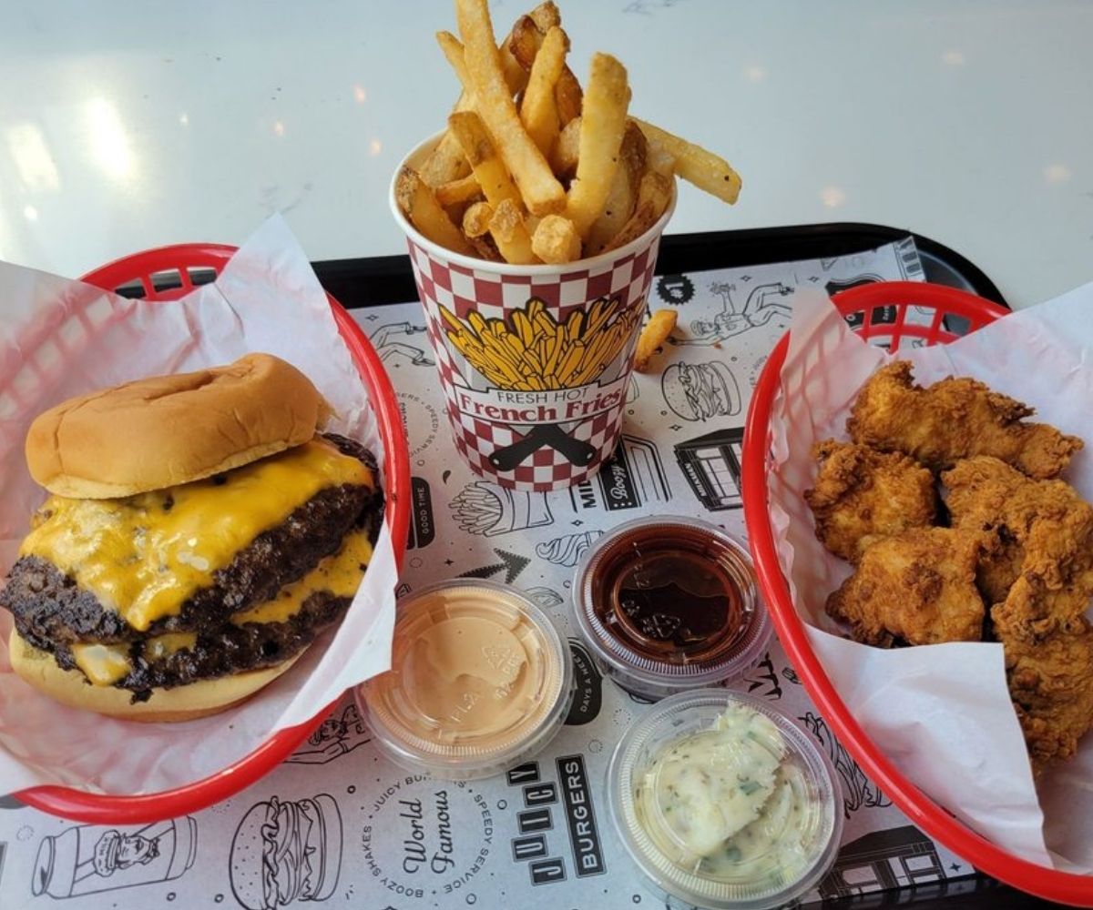 smashburger, chicken, and fries at Milkman in Cincinnati, Ohio