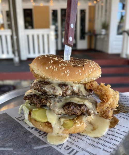 Burger with fried bacon at Penguin Drive In in Charlotte, NC