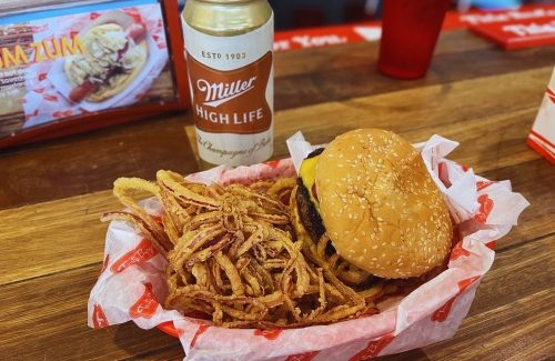 BBQ Onion Burger with onion rings at Tasty Burger in Boston, MA