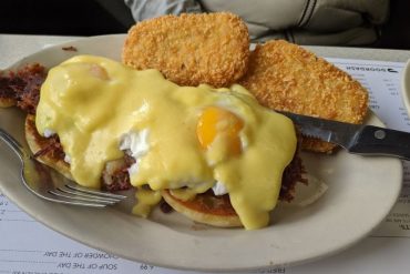 corned beef hash benedict with hash browns and home made corned beef hash at Suzie's Diner in Hudson, NH.