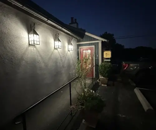 Entrance of The Whip Tavern at night