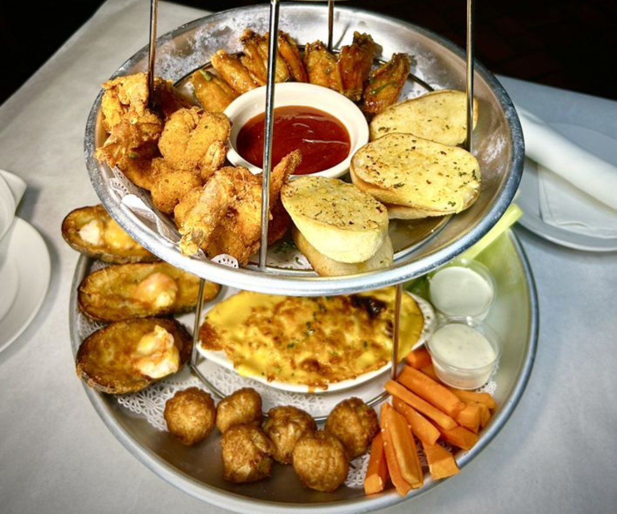 Seafood tower with different kinds of sauce