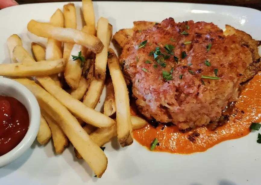 Andouille Crusted Grouper at Harry's Seafood Bar and Grille located in Lakeland, FL.