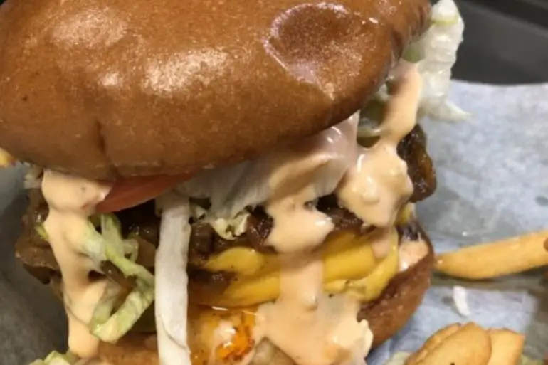 Animal Burger at Frog Pond Pub & Pizzeria located in Wilkes Barre, PA.