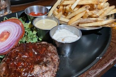 Burger and Fries at Tap 42 located in Boca Raton, FL.