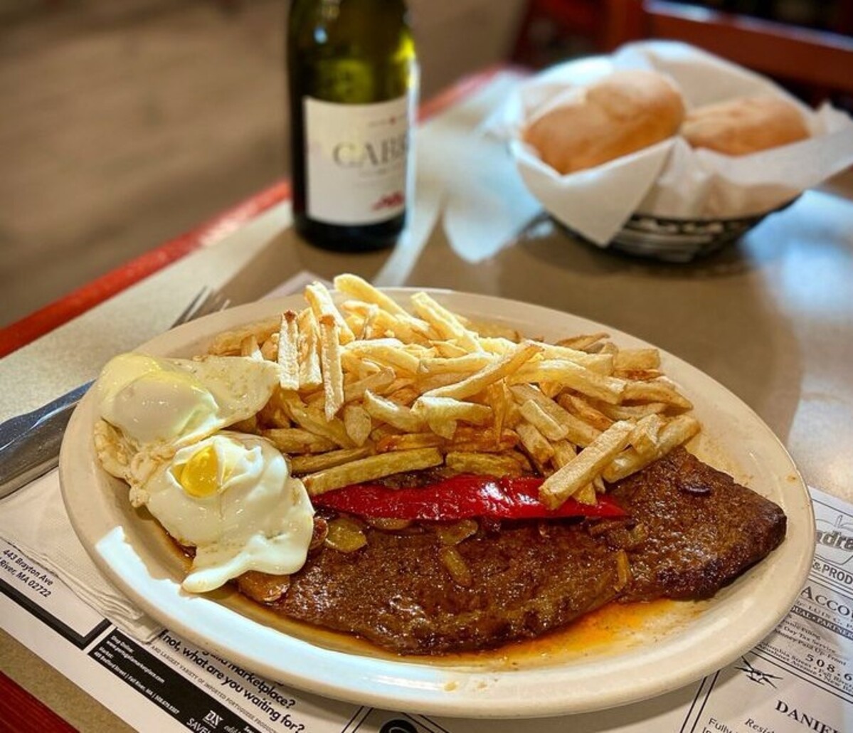 Caravela steak plate with eggs and fries at Caravela Family Restaurant located in Fall River, MA.