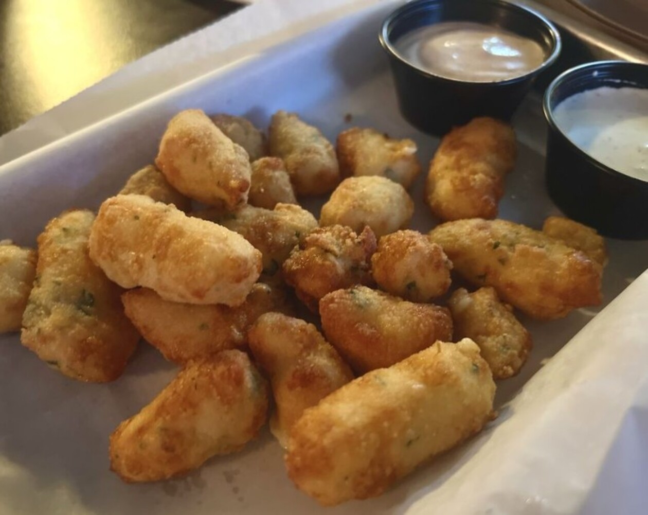 Cheese curds with ranch and chipotle ranch at Morgan's Tap & Grill located in Fort Wayne, IN. 