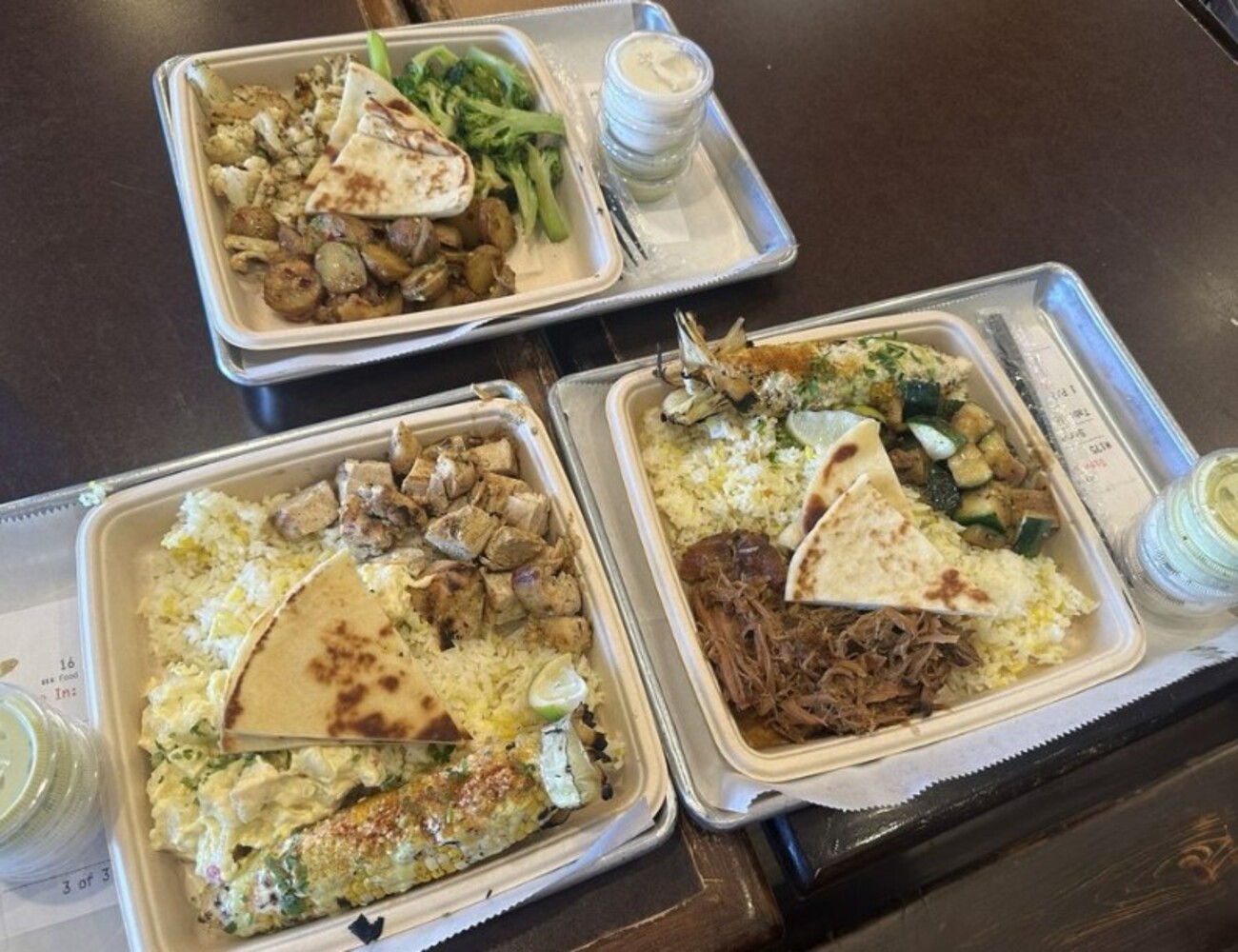 Chicken Plate, Pulled Pork Plate, and Just Sides Plate at Local Expedition Wood Fired Grill located in Alpharetta, GA. 