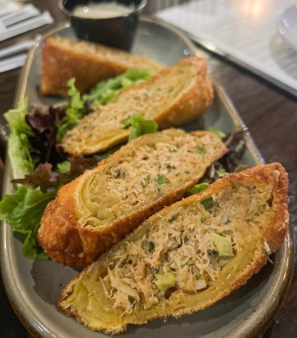 Crab Cake Eggs Rolls at Spotted Cow Steakhouse located in Winston-Salem, NC. 