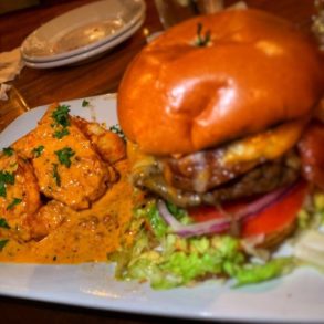Fried Grit Cake and Harry's Burger at Harry's Seafood Bar and Grille located in Lakeland, FL.
