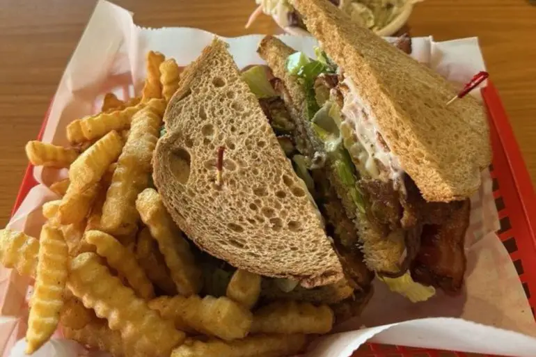 Fried green tomato BLT and fries at Todd and Shelly's Farm Fresh Restaurant located in Ocala, FL.