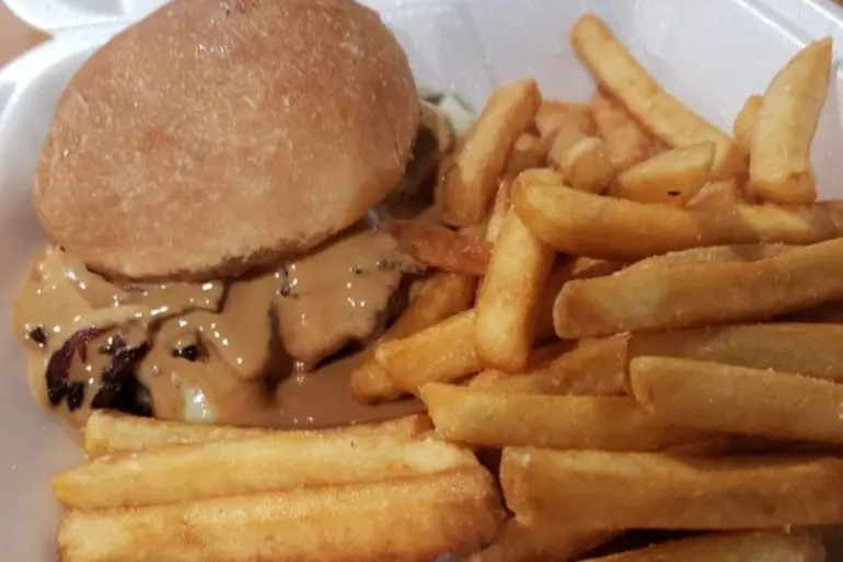 Good sized Peanut butter bacon burger with delicious crispy fries at Chef Von & Mom located in Scranton, PA.