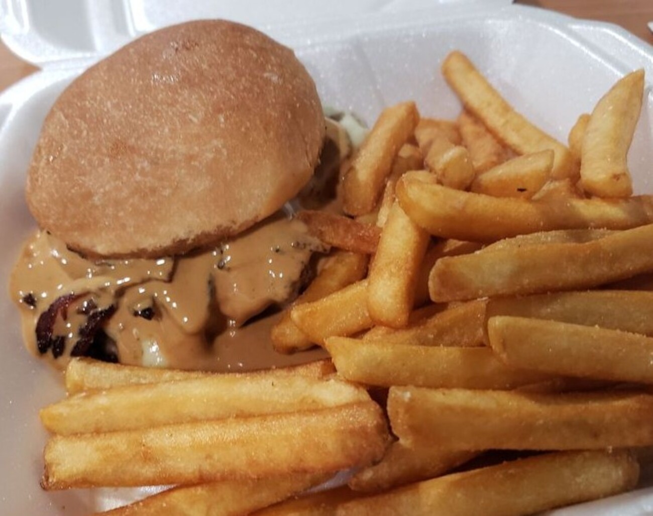 Good sized Peanut butter bacon burger with delicious crispy fries.