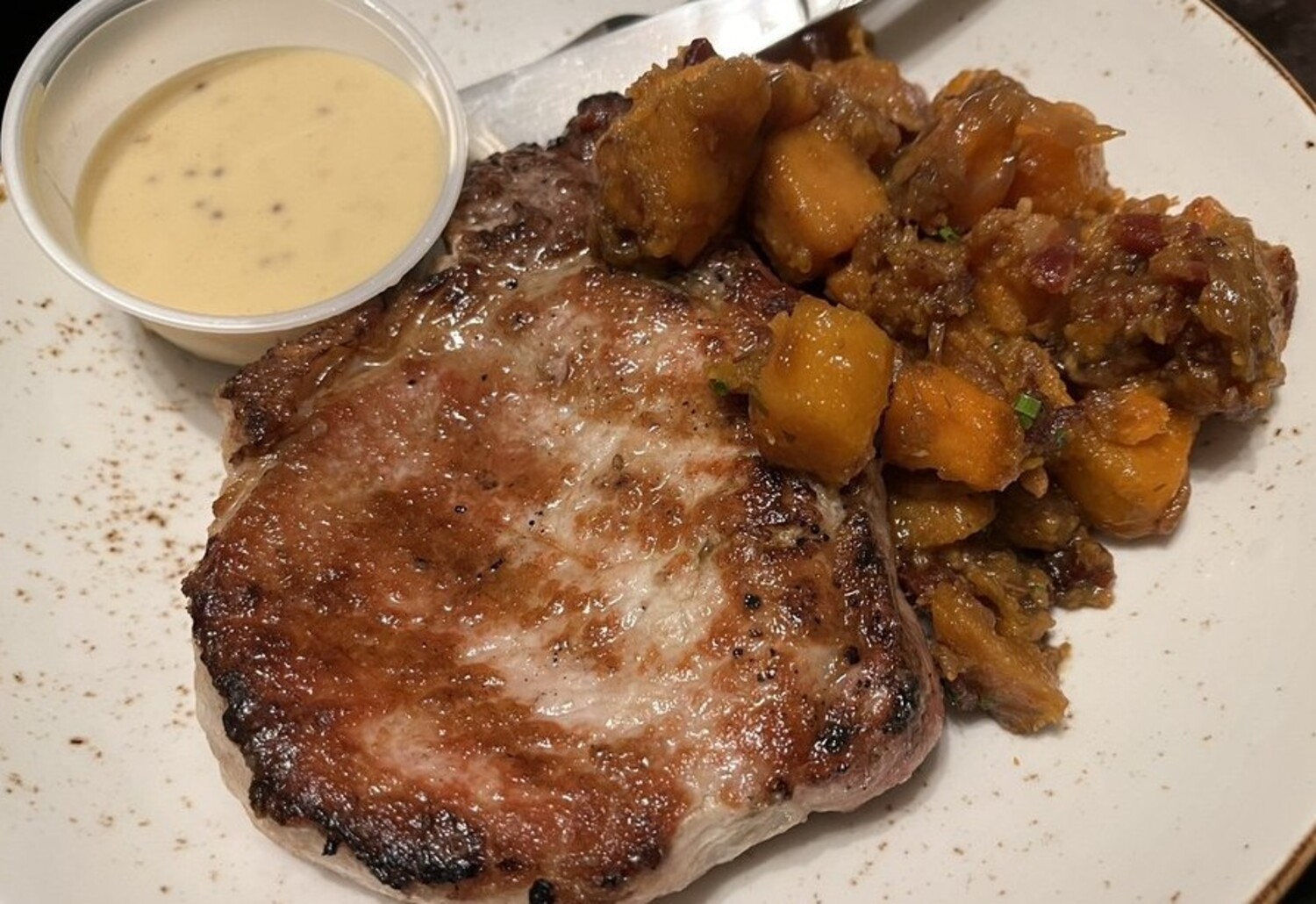 Grilled bone in porkchop at Firestone's located in Erie, PA. 